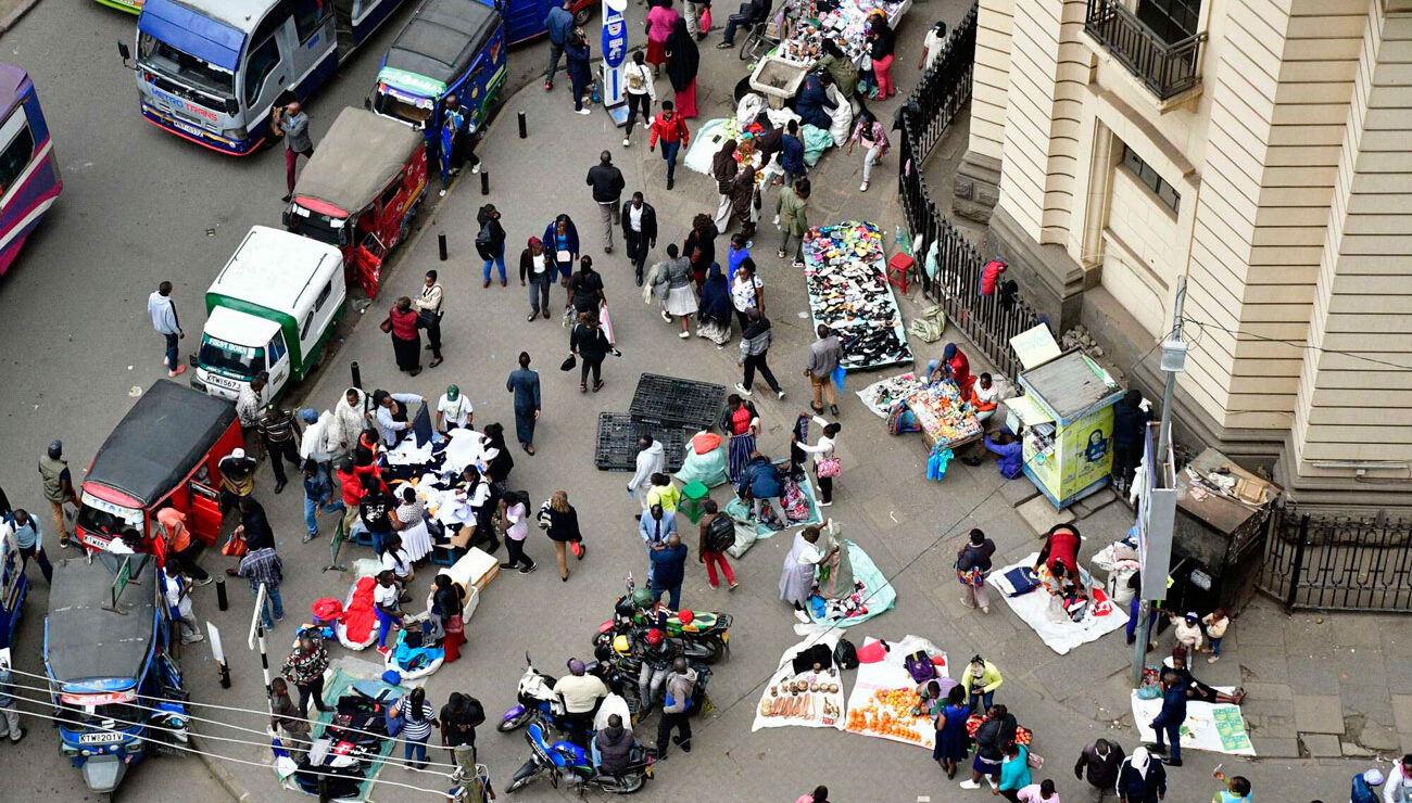 Busy Nairobi street with hustlers